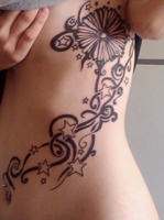 Flowery Ribs Tattoo
