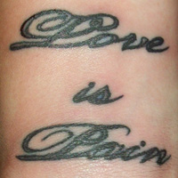 Love Is Pain Tattoo