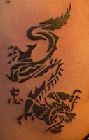 Tribal Dragon Tattoo